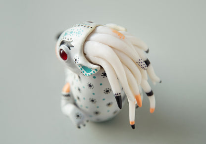 Dragon art doll with handpainted folk art ornament in swedish - norwegian - finnish style