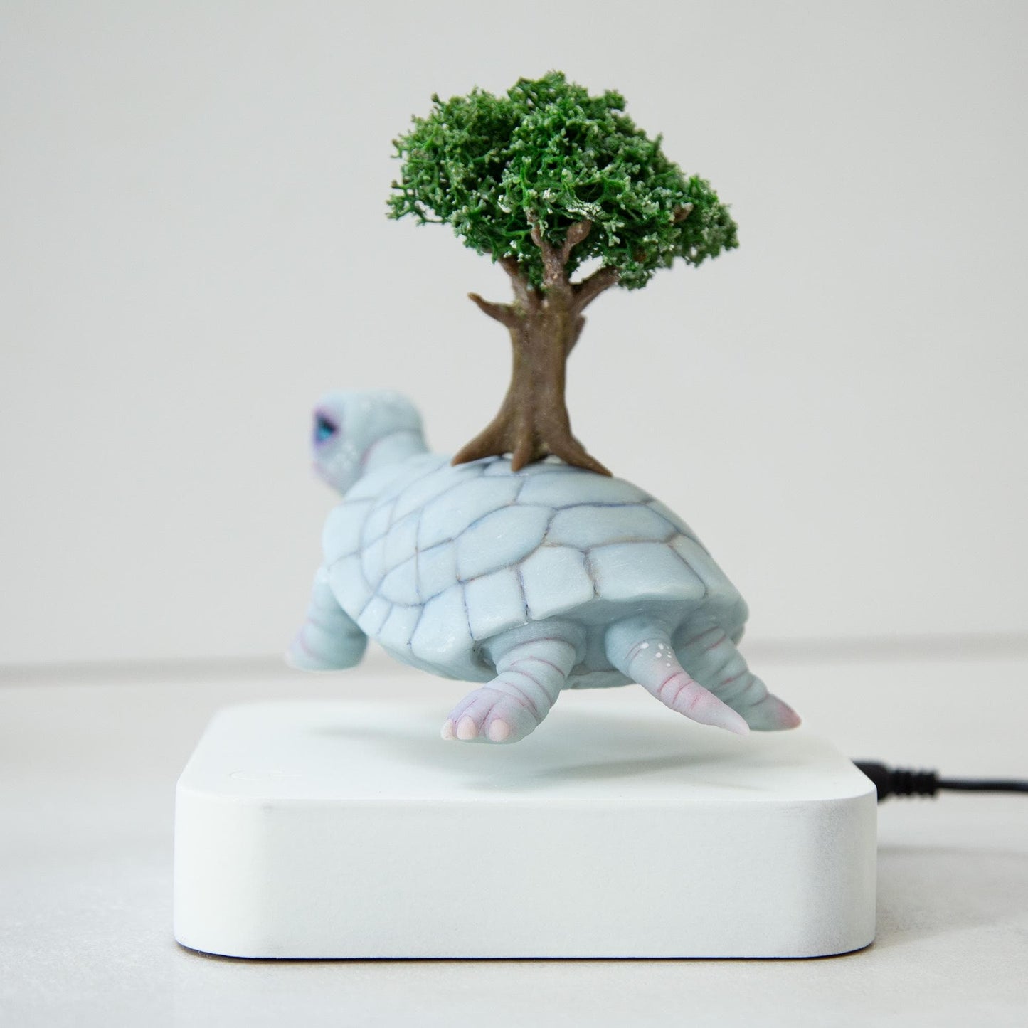 Levitating Turtle with tree of life on back kinetic sculpture, Native American mythical creature, weird and magic stuff