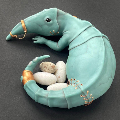 Strange ooak creepy alien doll with eggs, fantastic imaginary dragon like beast