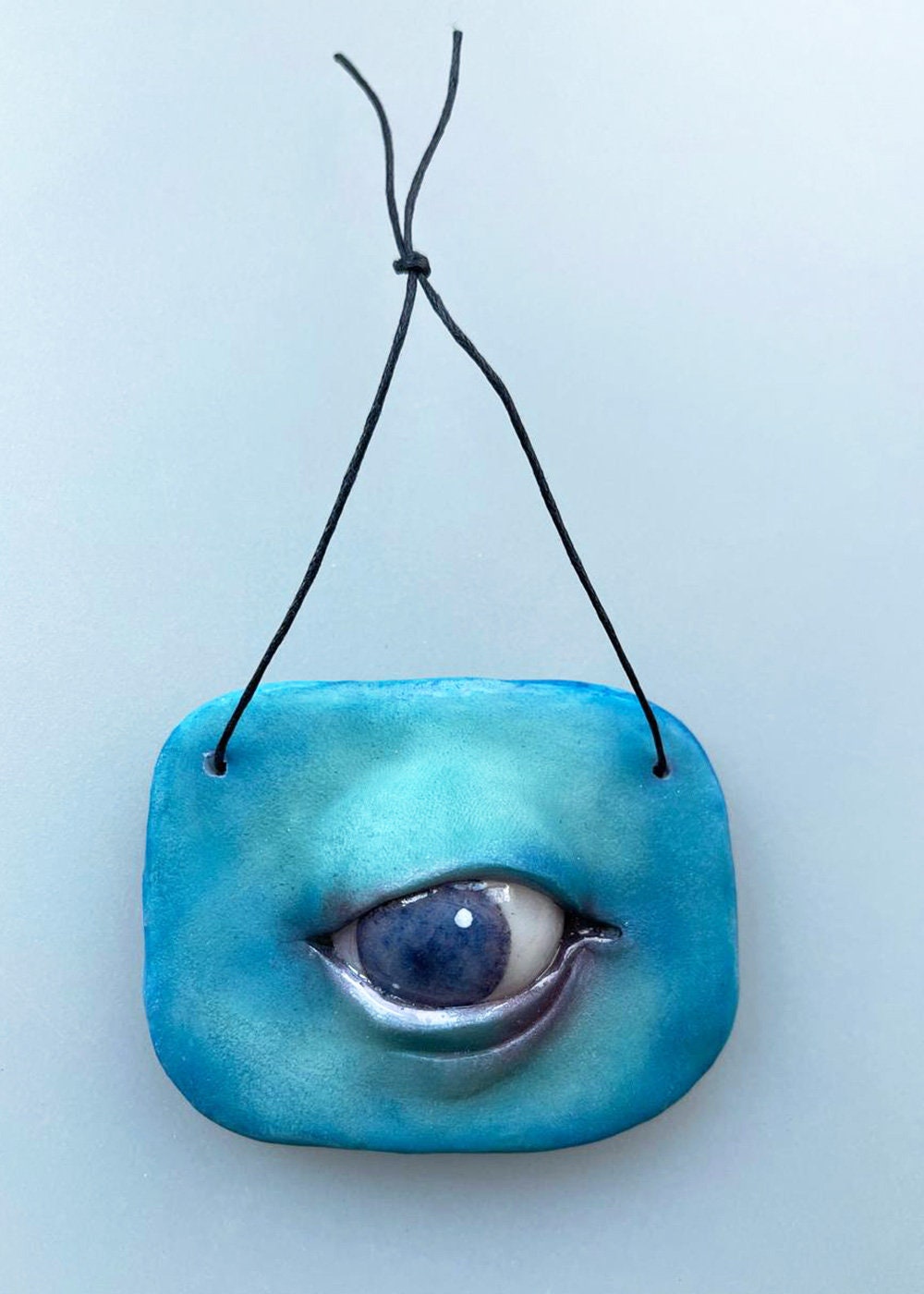 Light blue evil eye hanging wall decor, weird stuff, affordable art gift from ukranian artist