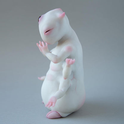 Alien budda creature statue with opened third all seeing eye, weird character from fantastic planet