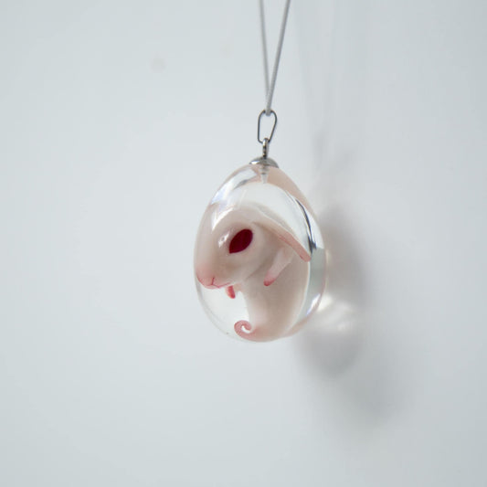 Baby Rabbit in egg pendant. Embryo horror jewelry, necklace with cute rabbit inside