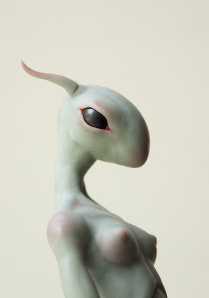 Alien girl sculpture, sexy sci fi character with thin body and cute face