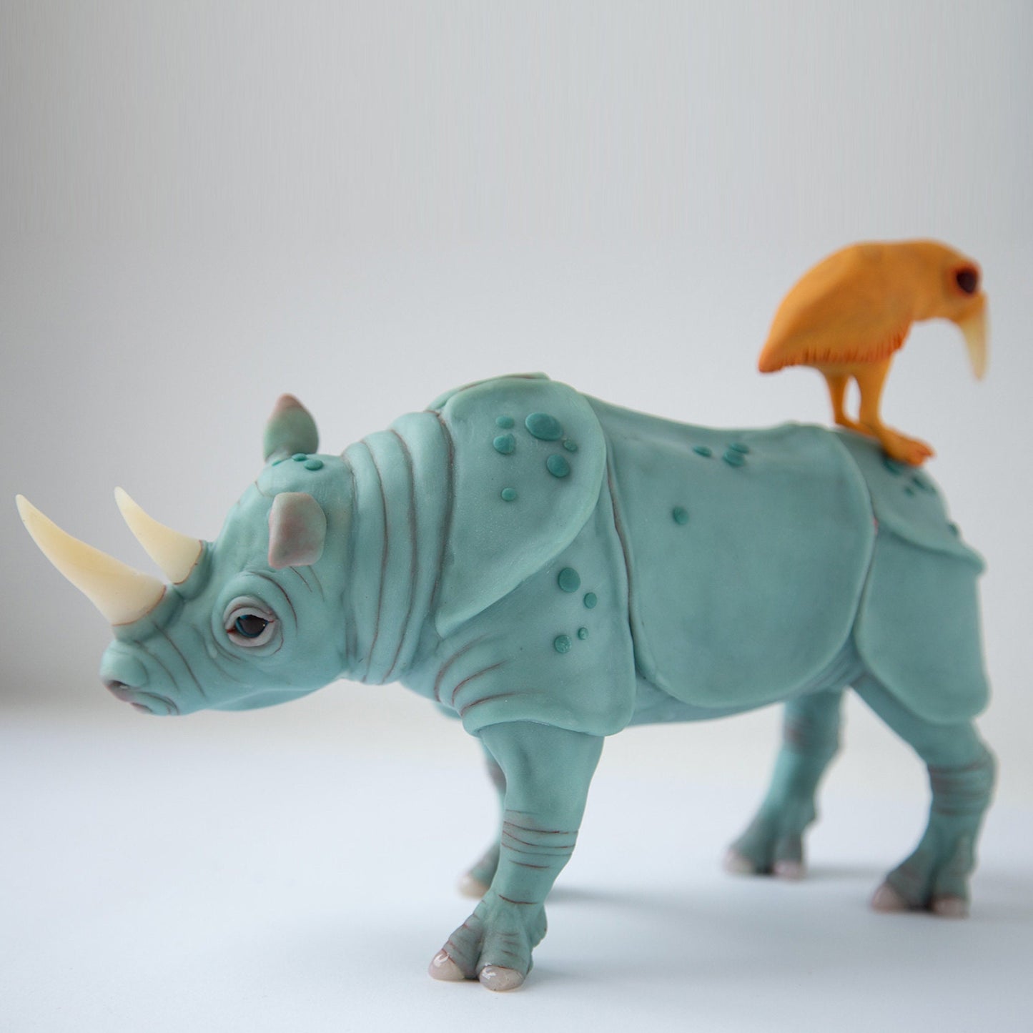 Perfect marriage - brilliant sculpture gift for couple, rhino and bird family statue