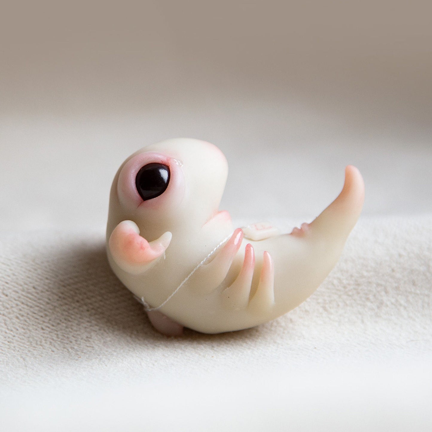 Creepy cute alien embryo monster doll figurine, polymer clay sculpture with rune protection