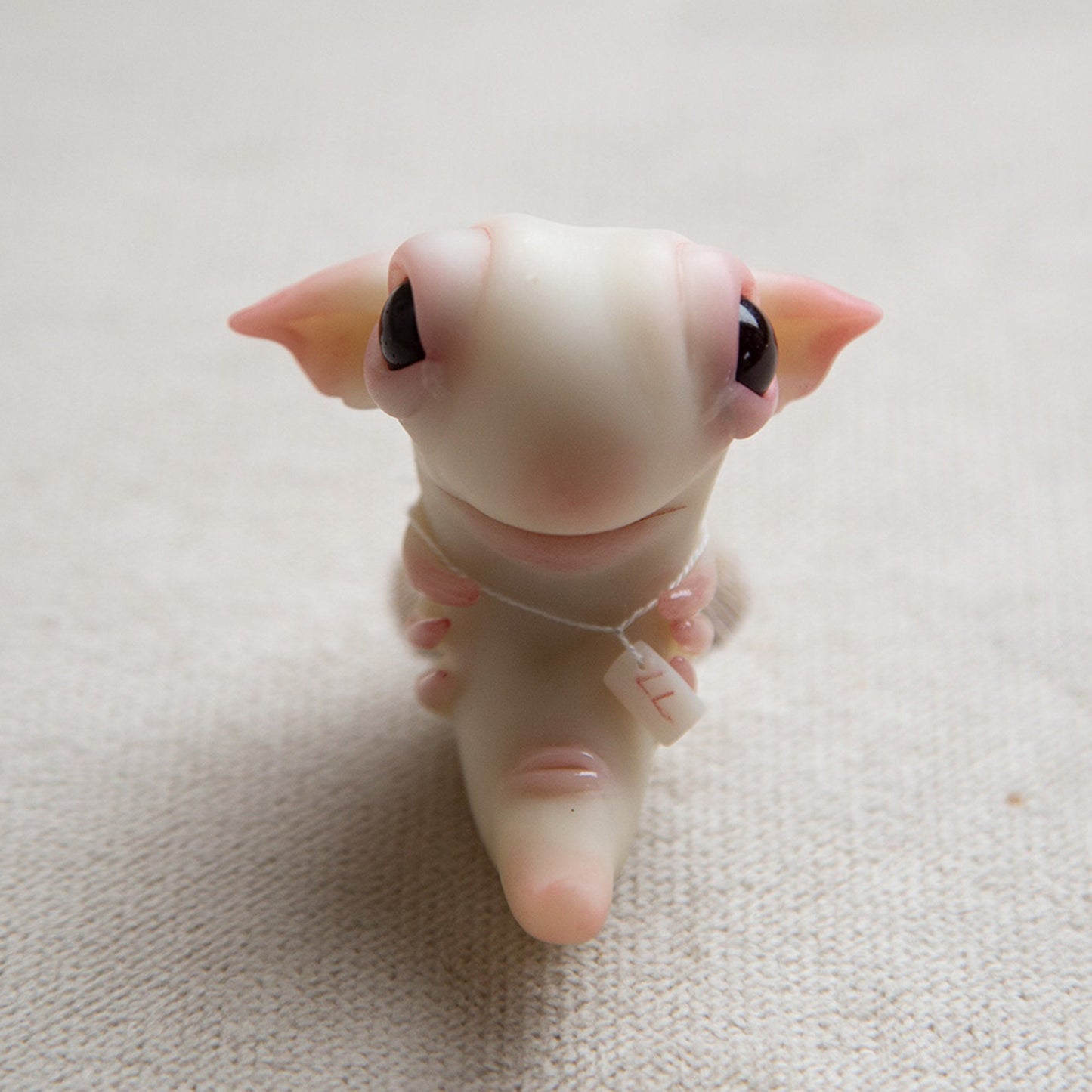 Creepy cute alien embryo monster doll figurine, polymer clay sculpture with rune protection