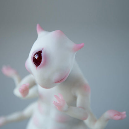 Alien budda creature statue with opened third all seeing eye, weird character from fantastic planet