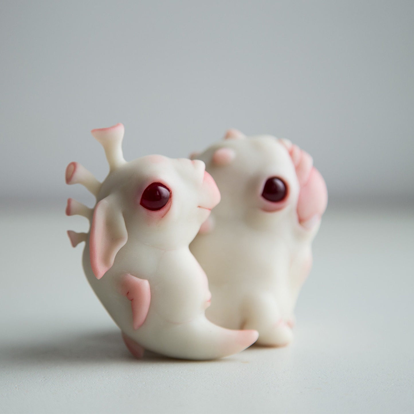 Baby alien weird sea horse sculpture art doll,  cute figurine with albino eyes in anime style