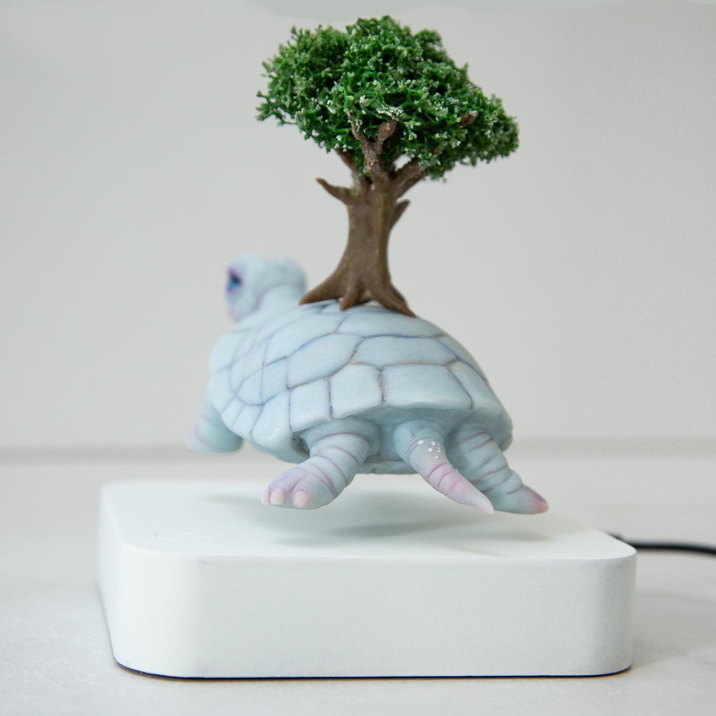 Levitating Turtle with tree of life on back kinetic sculpture, Native American mythical creature, weird and magic stuff