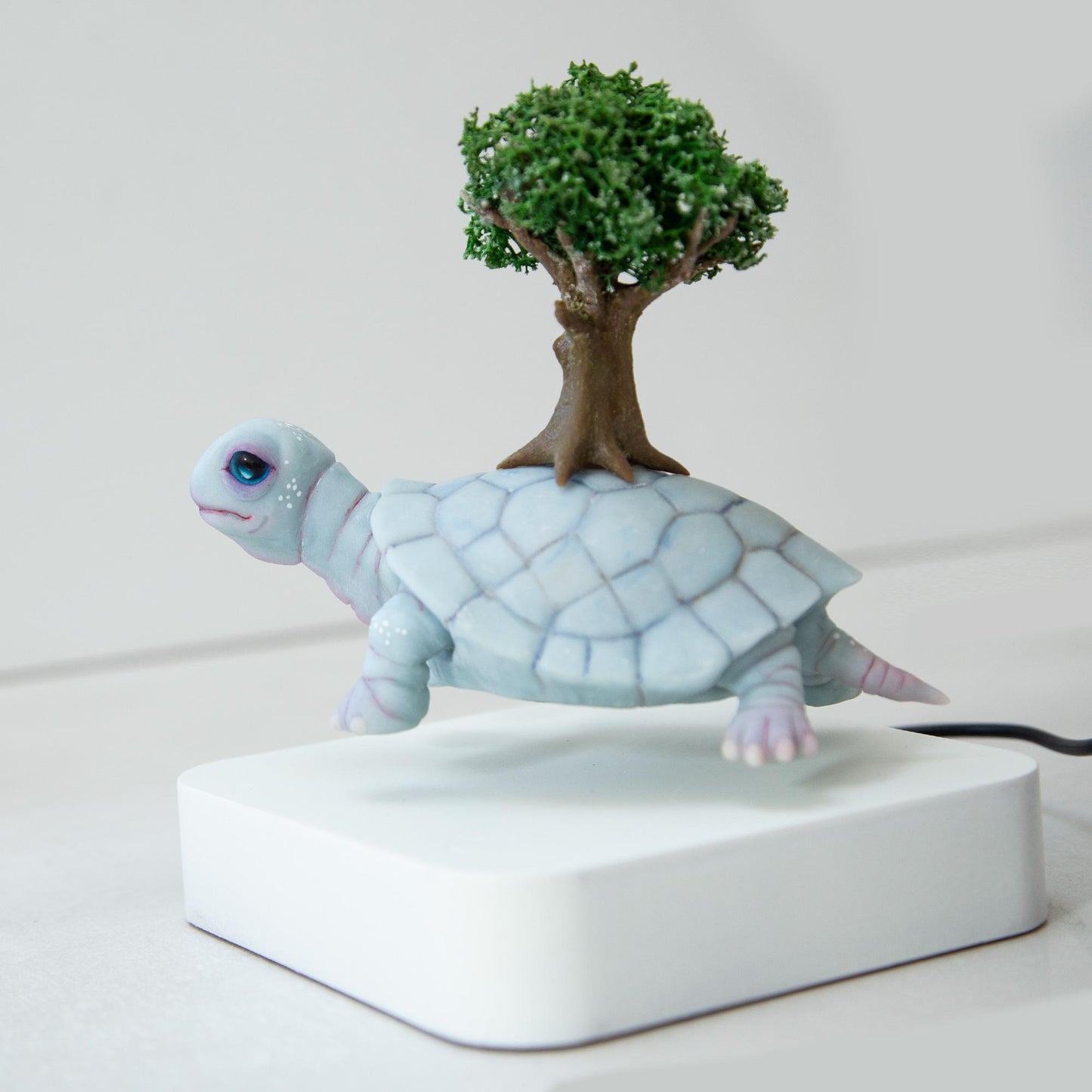 Levitating Turtle with tree of life on back kinetic sculpture, Native American mythical creature, weird and magic stuff