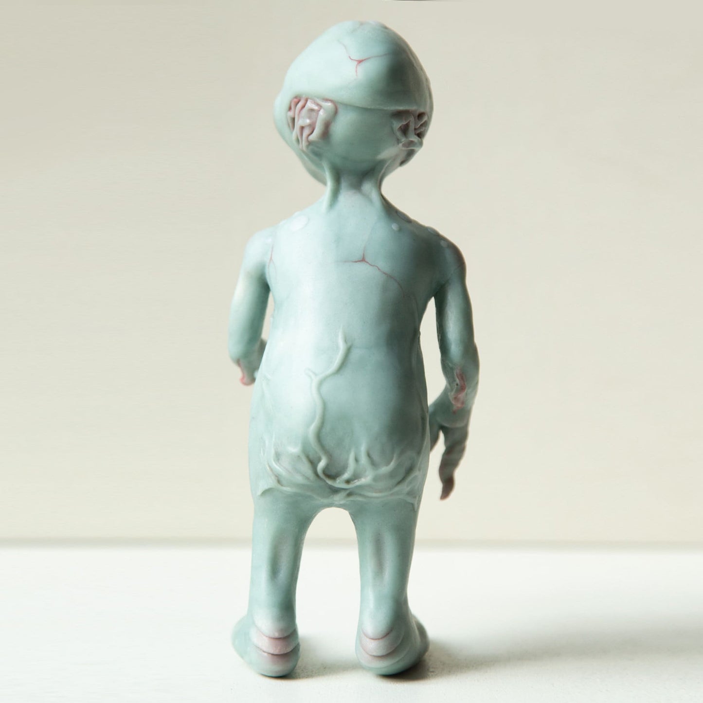 Grey alien baby doll sculpture, cute small extraterrestrial lifeform. OOAK art doll created and made in our team.