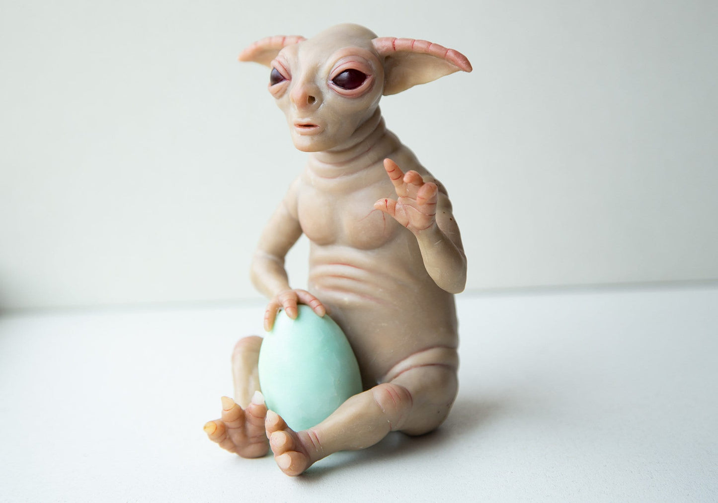 Statue of alien from yoda race, alien miniature, creature art yoda doll