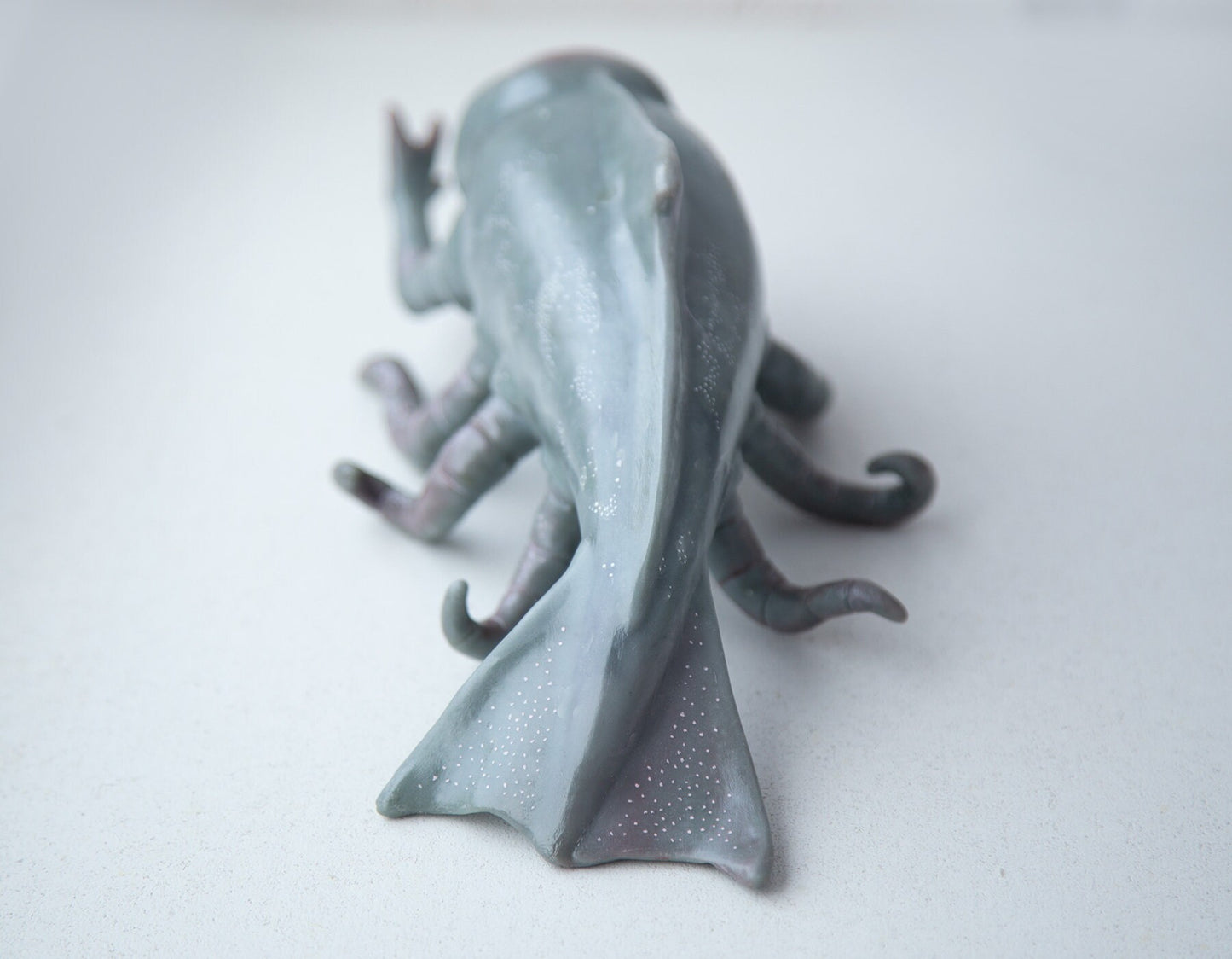 Alien cryptid kraken-whale deep sea creature, creepy sculpture, alien figurine with tentacle