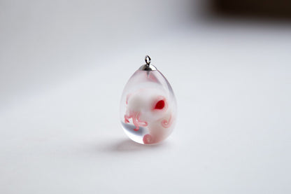 Baby cthulhu in egg pendant. Alien horror jewelry, necklace with cute octopus cryptid