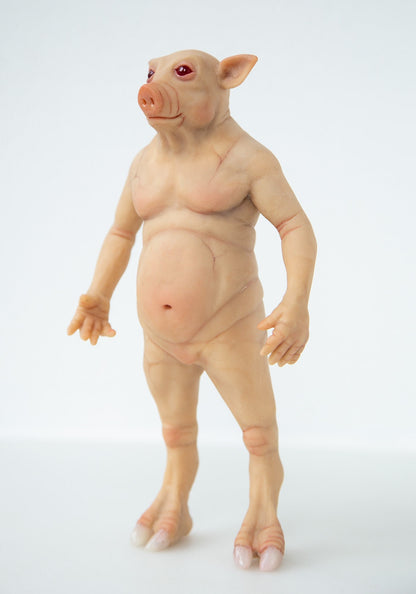 A sculpture of a pink pig man, an urban legend hero from Vermont. He is fat, heavyset, has hooves on his feet and a pig snout on his face. The sculpture is made of translucent pink polymer, the hooves are made of bone-colored polymer