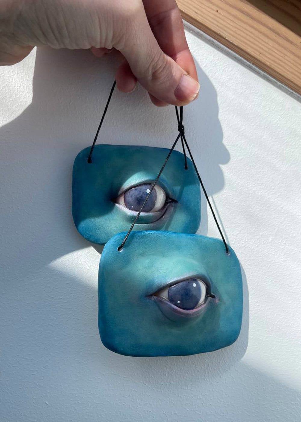 Light blue evil eye hanging wall decor, weird stuff, affordable art gift from ukranian artist