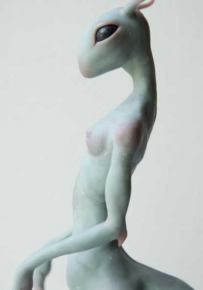 Alien girl sculpture, sexy sci fi character with thin body and cute face