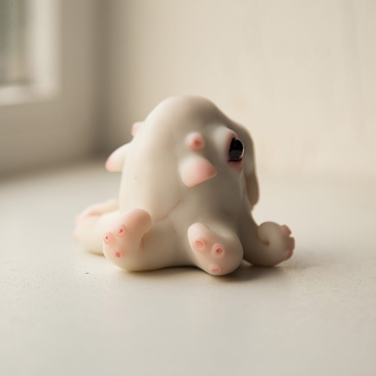 Octopus baby doll sculture, cute cthulhu anime figurine, kraken miniature creature art doll.