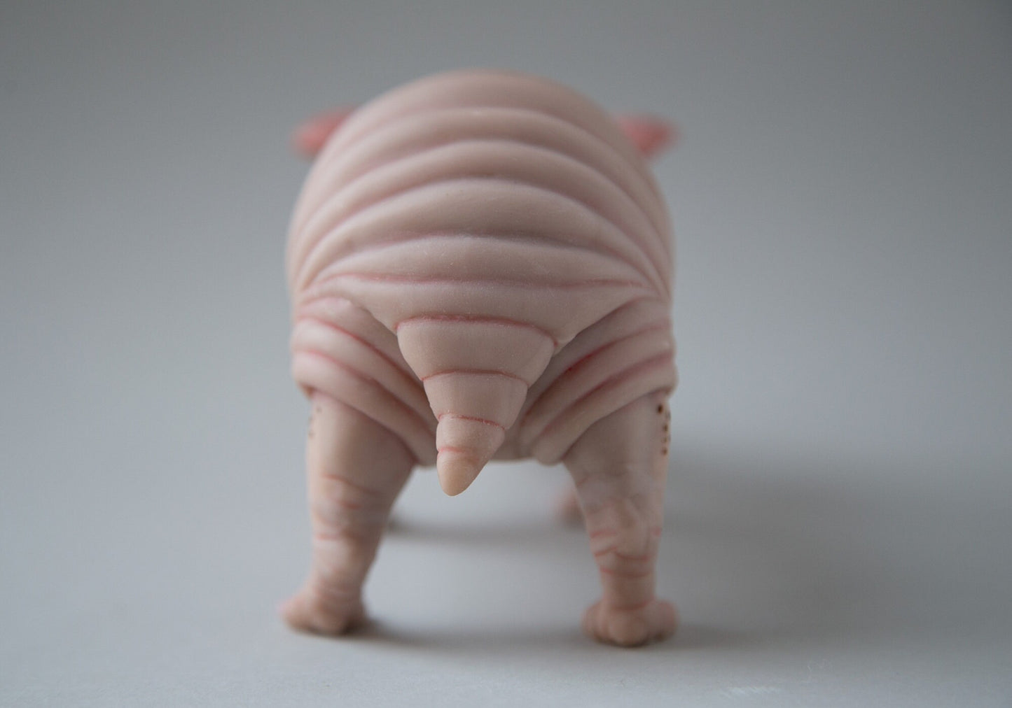 Fat and cute hamster-guinea pig-rat naked animal art doll. Nude and pink like mice mouse figurine