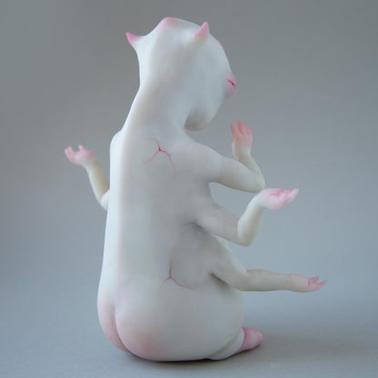 Alien budda creature statue with opened third all seeing eye, weird character from fantastic planet