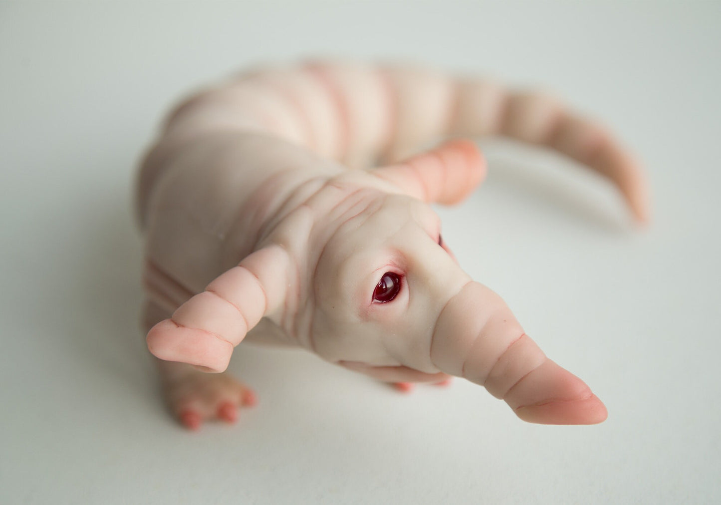 Weird fantastic beast alien baby doll sculpture, worm - elephant lil cutie from fantastic planet