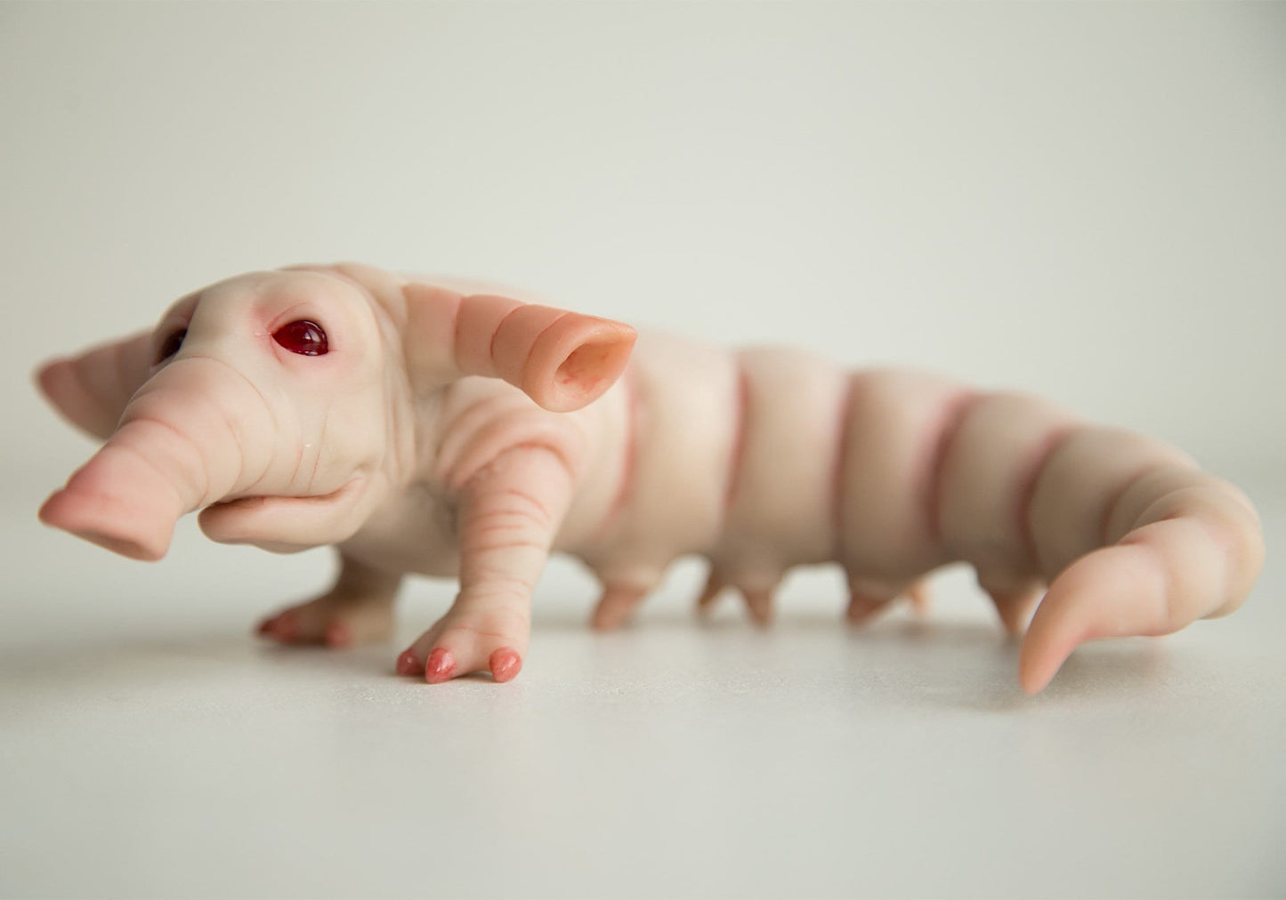 Weird fantastic beast alien baby doll sculpture, worm - elephant lil cutie from fantastic planet