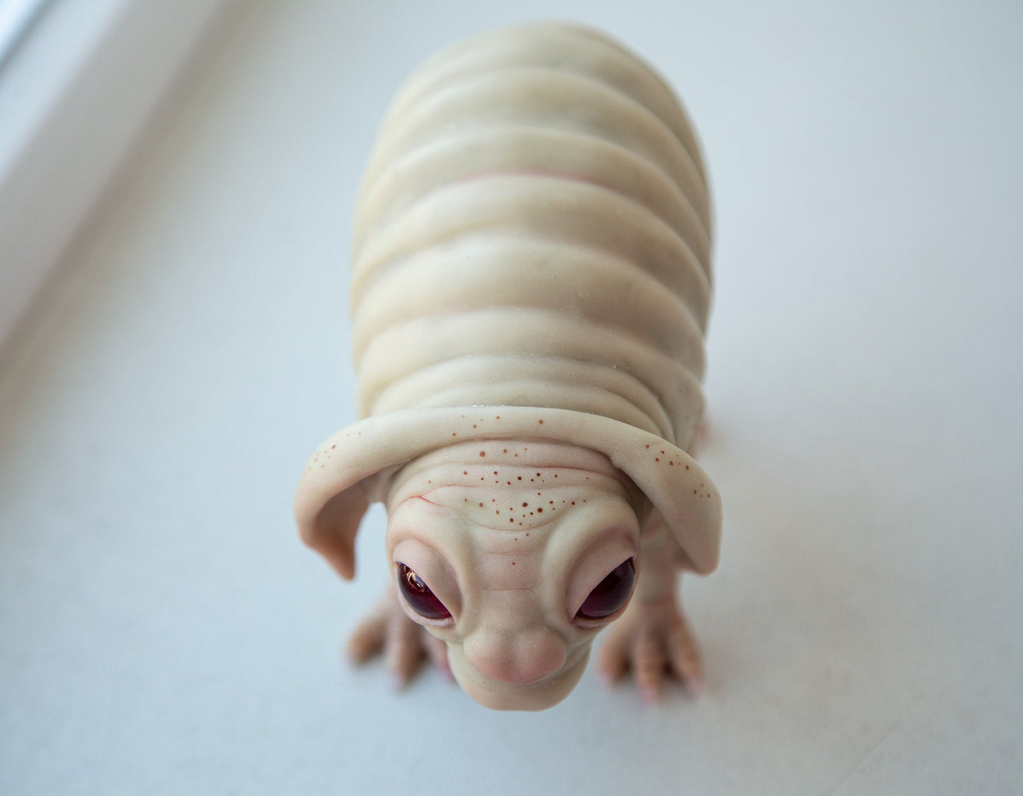 Squonk of Pennsylvania, creepy cute weird and sad PA cryptid creature, weird sculpture cryptid miniature