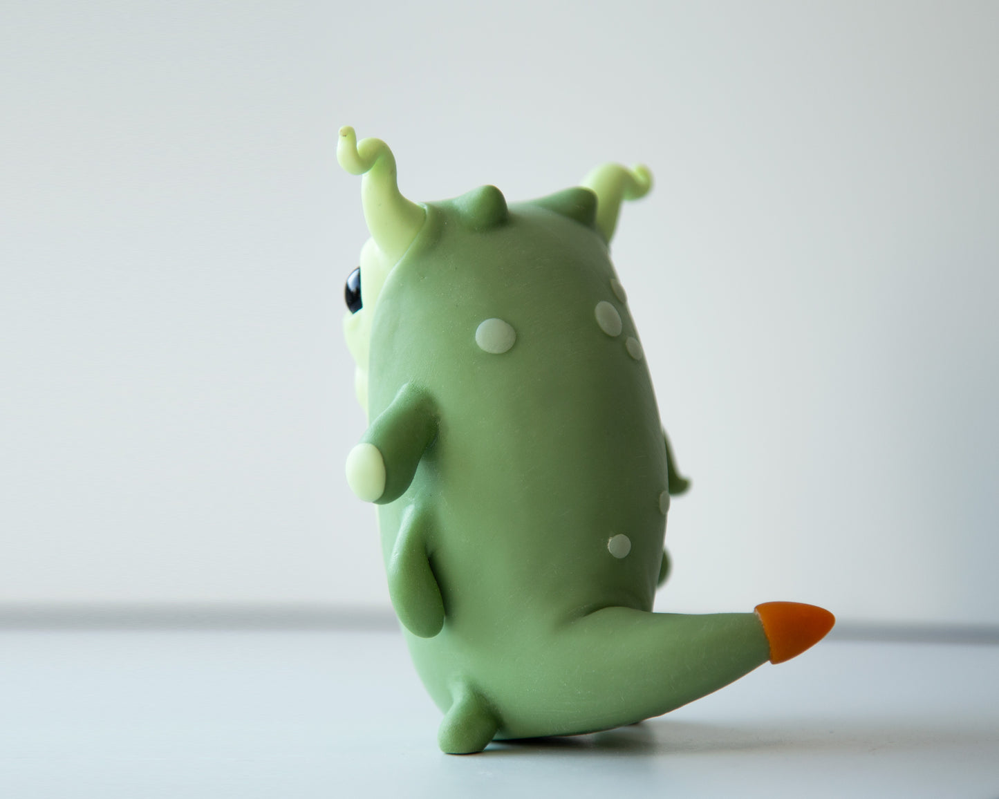 Cool and weird Germ Microbe figurine in anime style, polymer clay creature art doll, creepy cute monster character