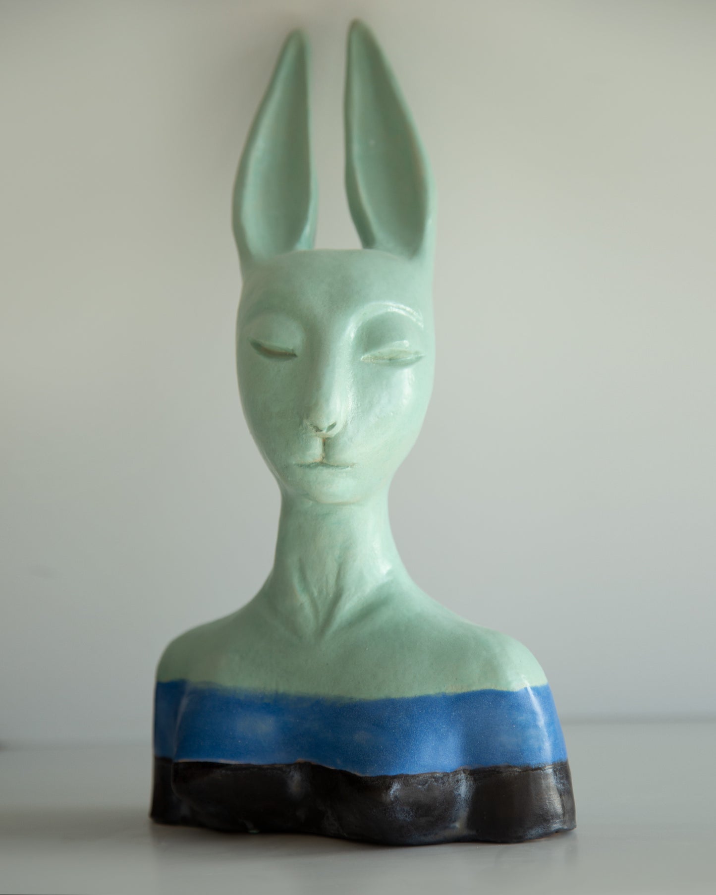 Hare woman bust statue with proud face, whimsical ceramic sculptural original art decor, mint-blue-black color