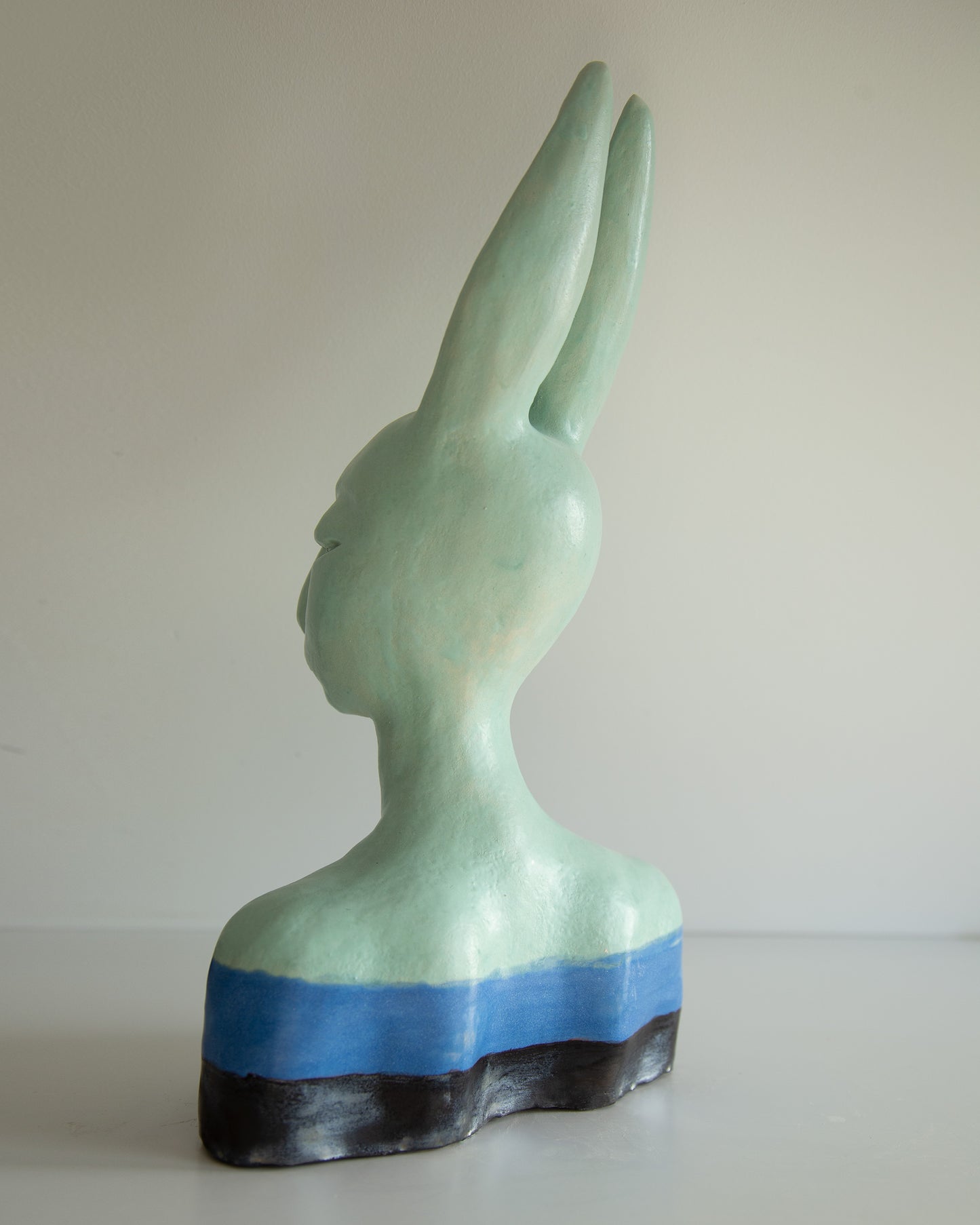 Hare woman bust statue with proud face, whimsical ceramic sculptural original art decor, mint-blue-black color