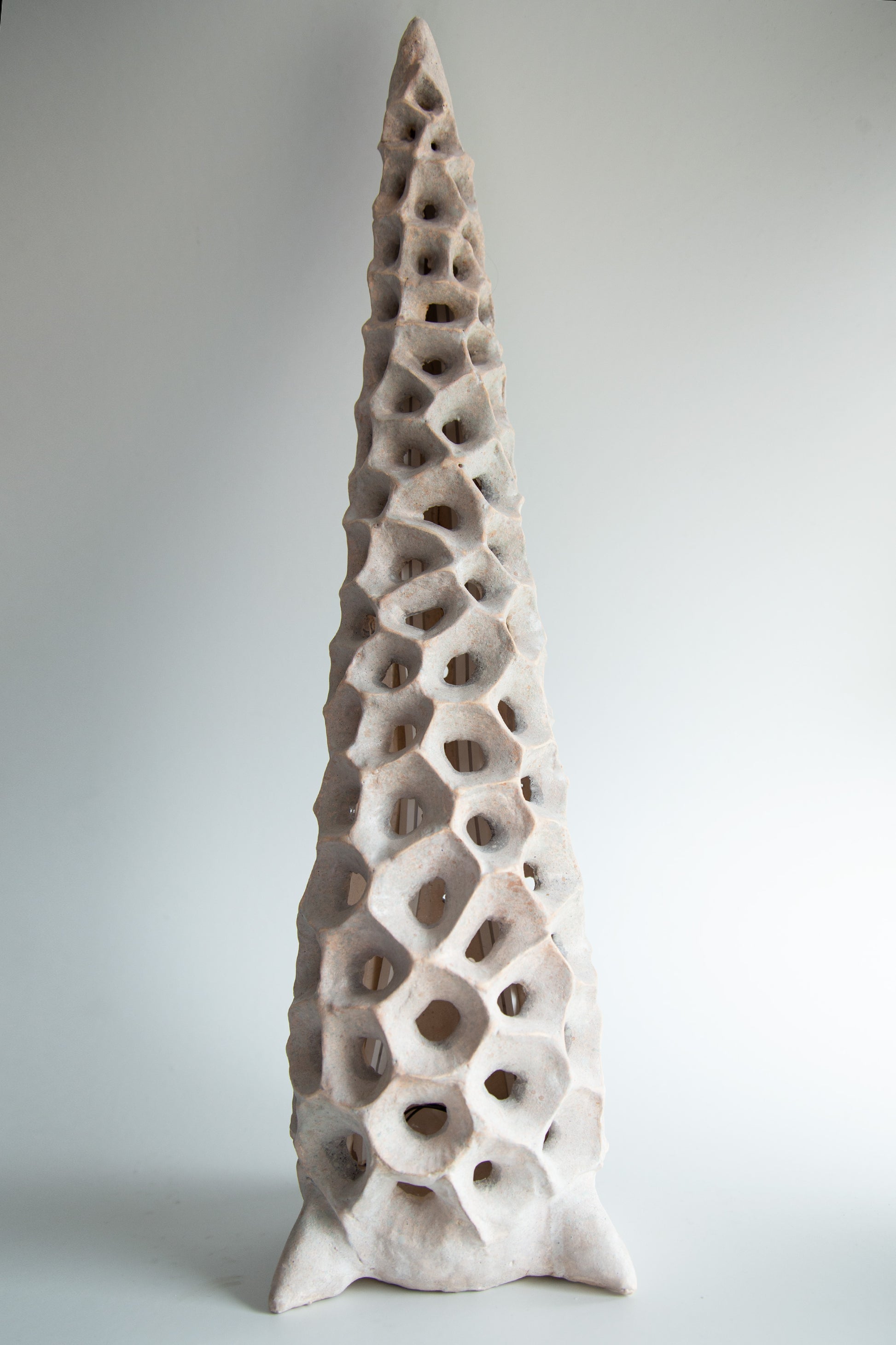 Tall sculptural ceramic floor lamp inspired by natural forms