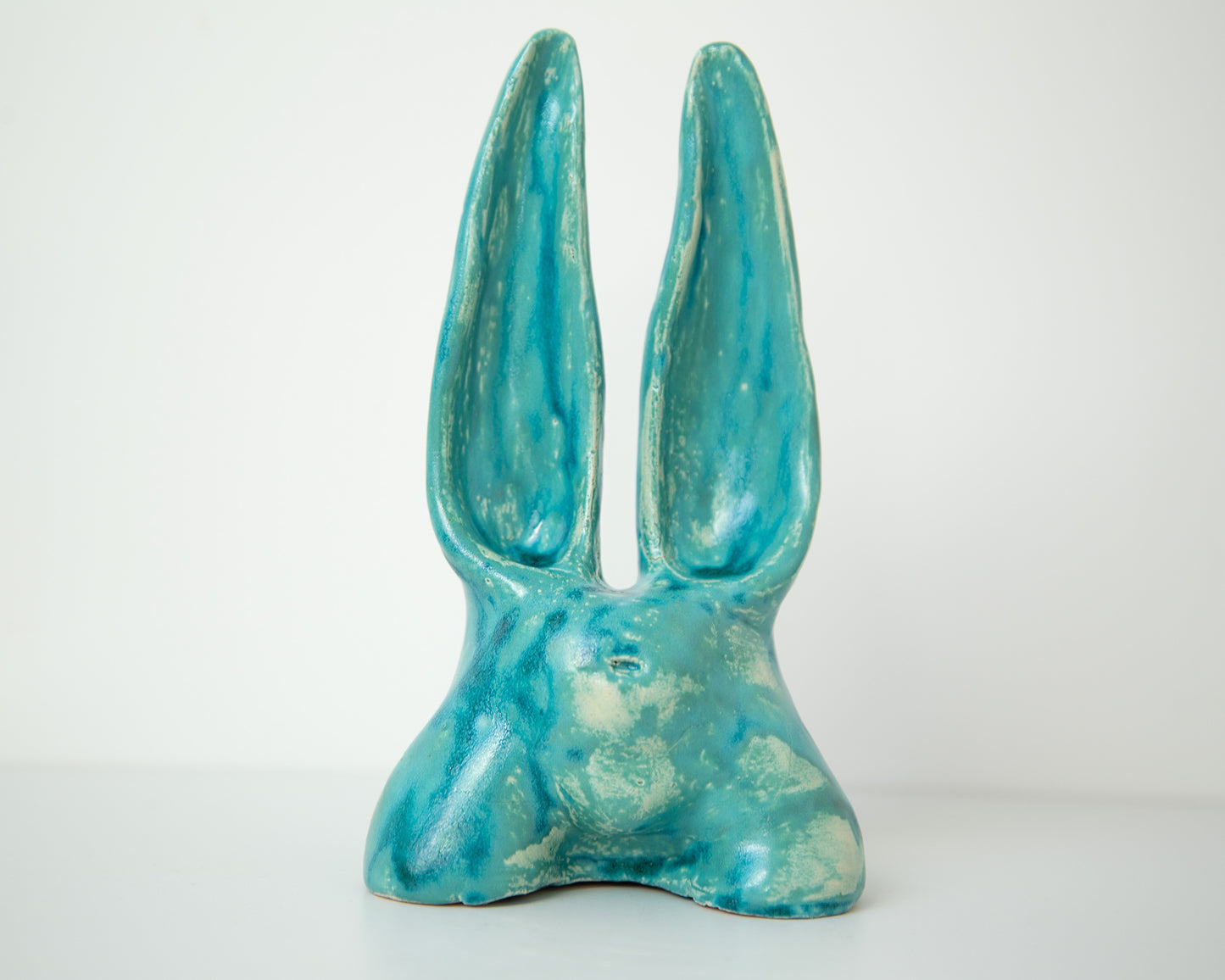 Glazed Ceramic Nude Sculpture: Playful Bunny-Eared Booty Art