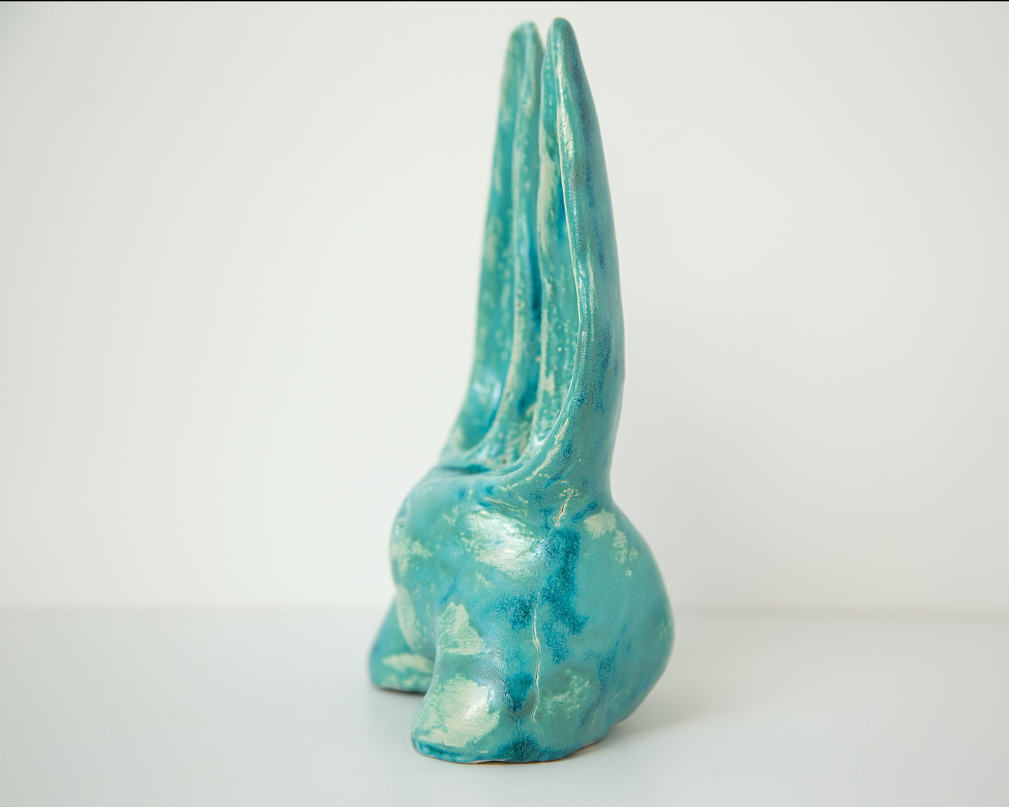 Glazed Ceramic Nude Sculpture: Playful Bunny-Eared Booty Art