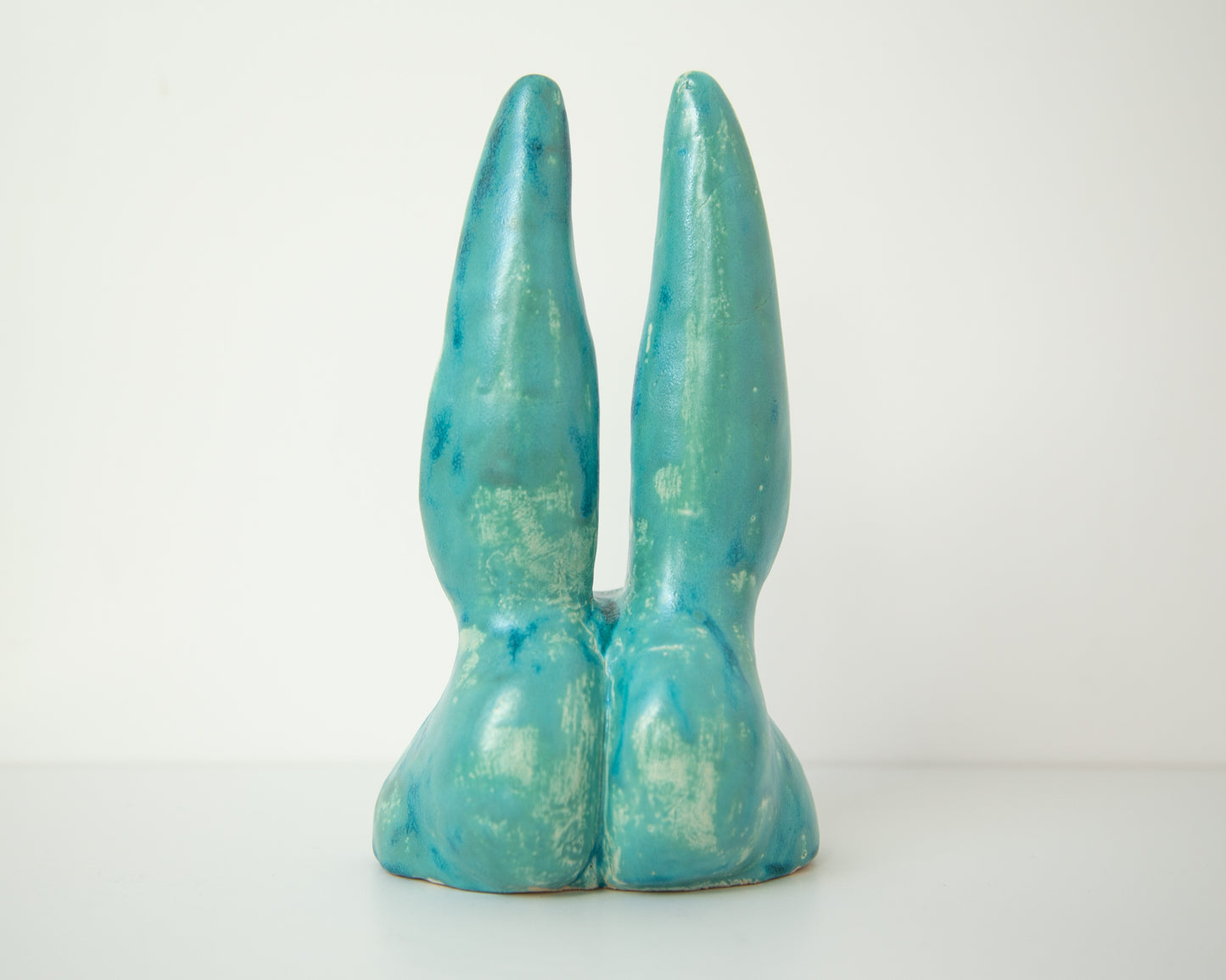 Glazed Ceramic Nude Sculpture: Playful Bunny-Eared Booty Art