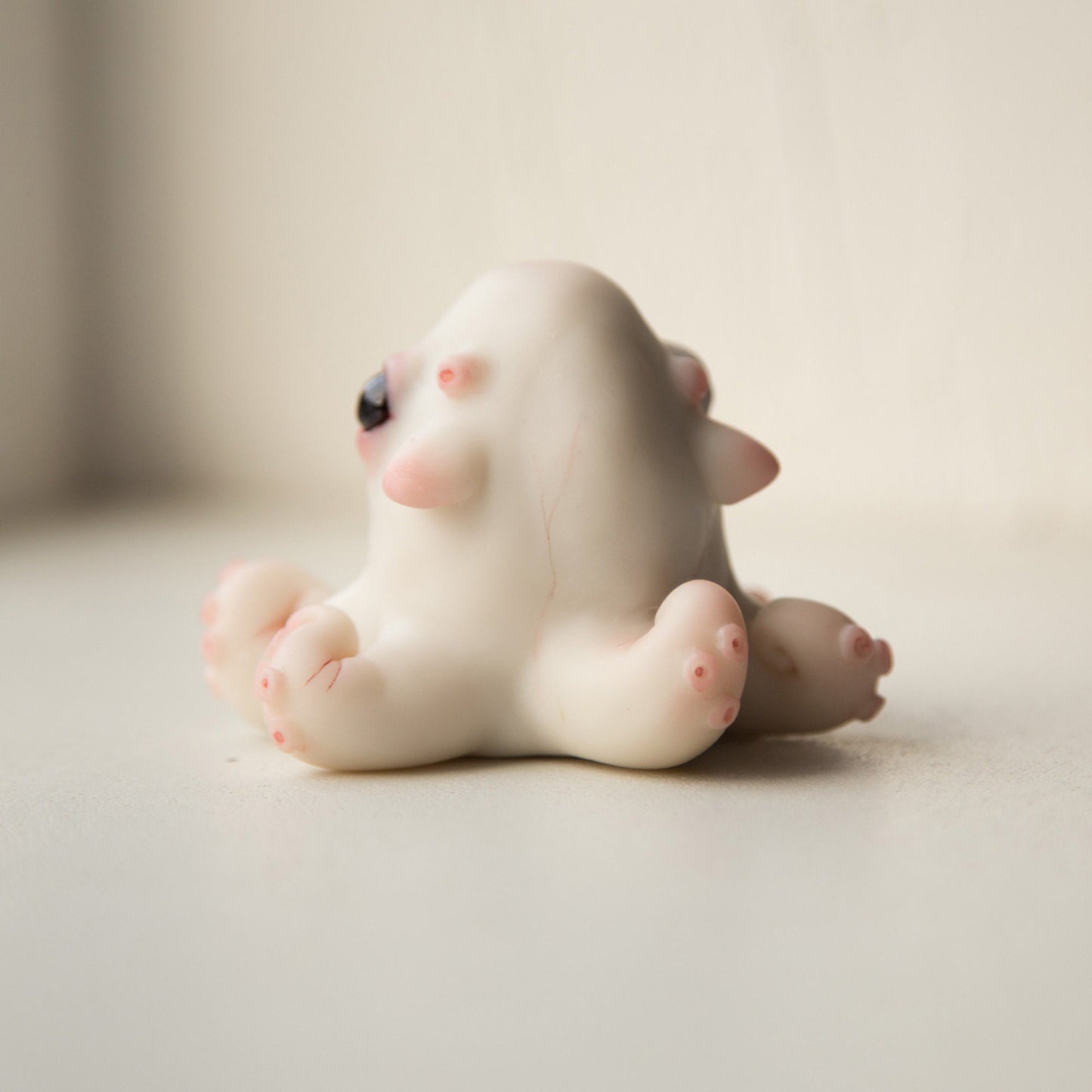 Octopus baby doll sculture, cute cthulhu anime figurine, kraken miniature creature art doll.