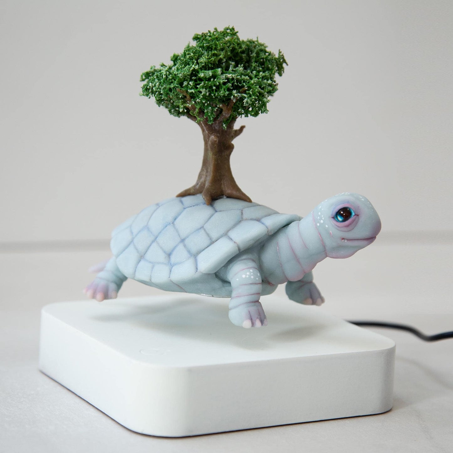 Levitating Turtle with tree of life on back kinetic sculpture, Native American mythical creature, weird and magic stuff