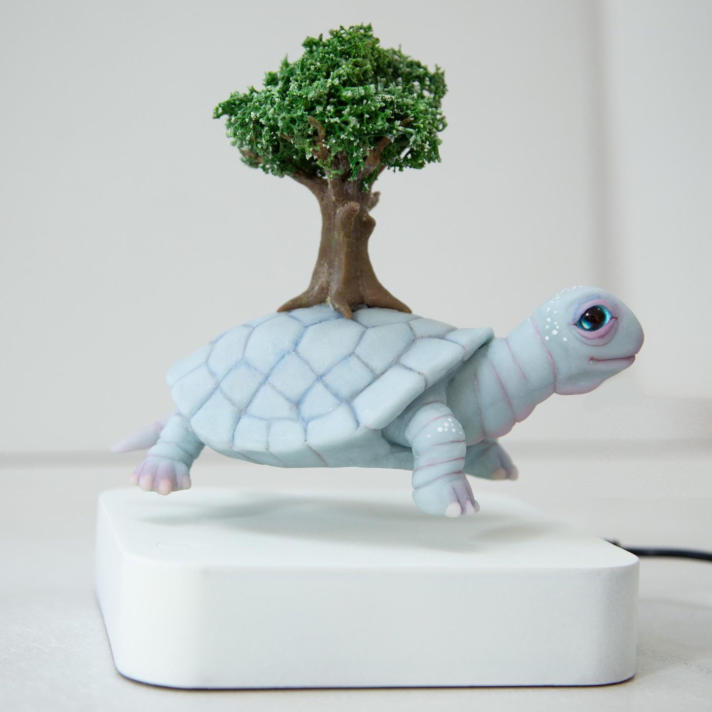 Levitating Turtle with tree of life on back kinetic sculpture, Native American mythical creature, weird and magic stuff