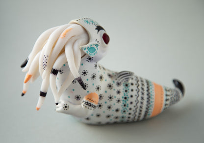 Dragon art doll with handpainted folk art ornament in swedish - norwegian - finnish style