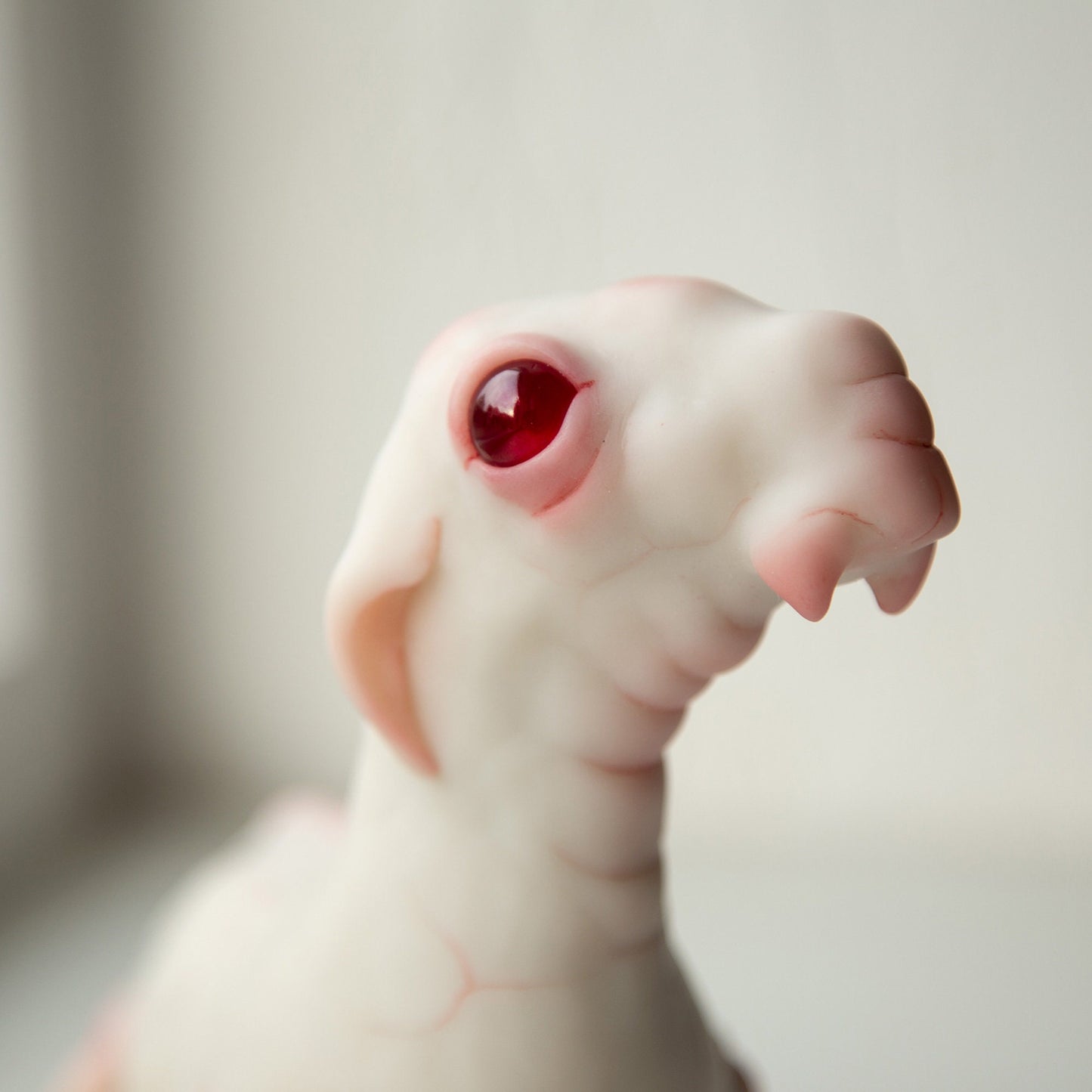 Nessie loch ness cryptid figurine, ooak weird sculpture of mythical creature with albino eyes in anime style