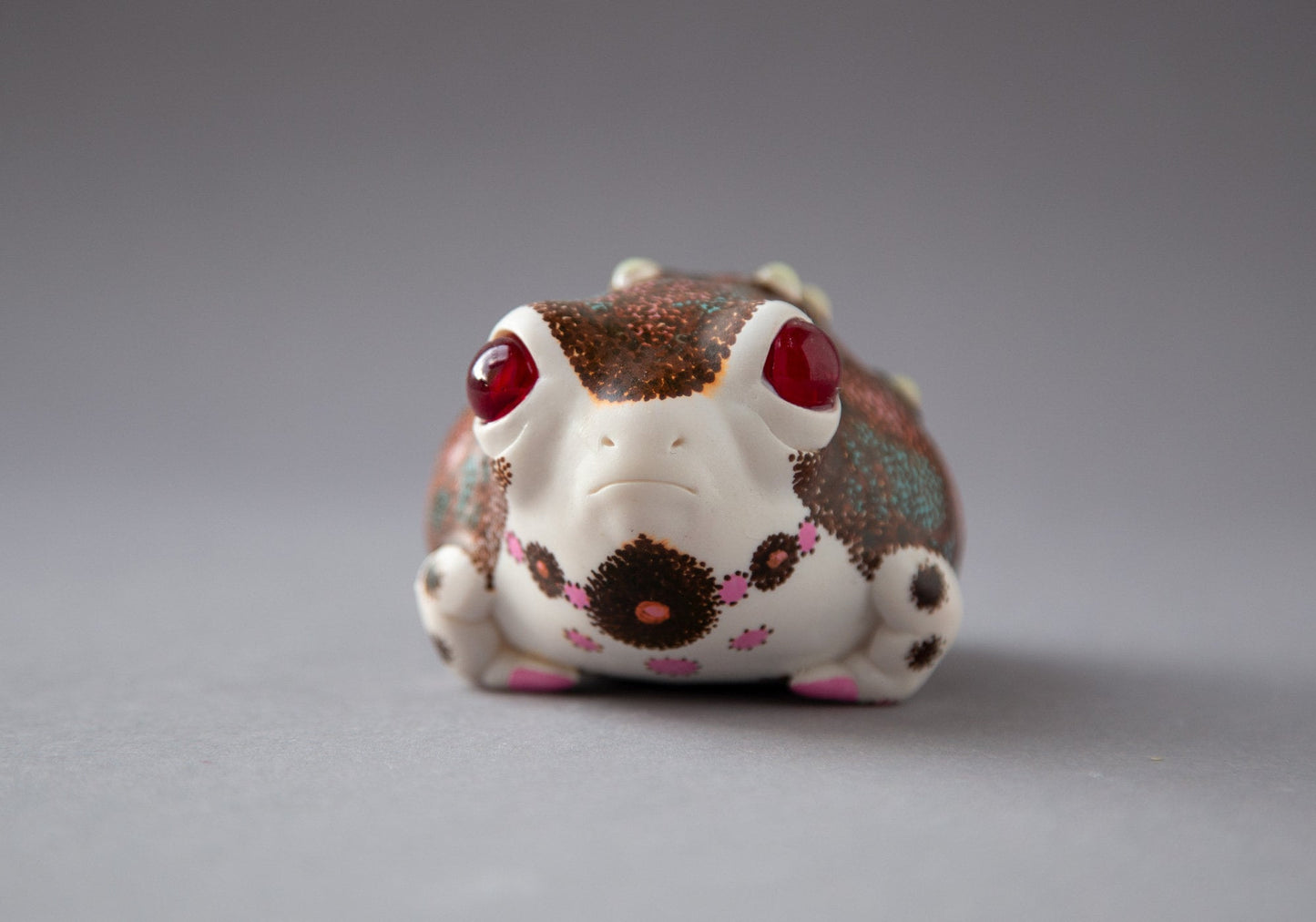 OOAK weird sculpture of frog with european folk art ornament and luminescent glow in the dark pimples