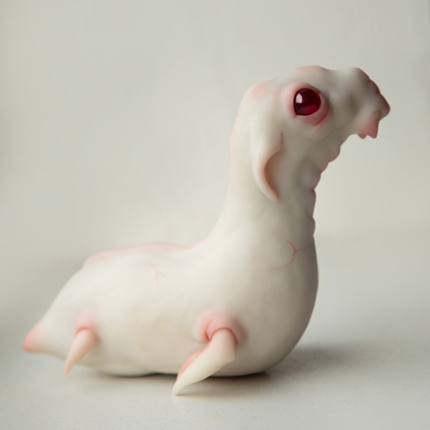 Nessie loch ness cryptid figurine, ooak weird sculpture of mythical creature with albino eyes in anime style