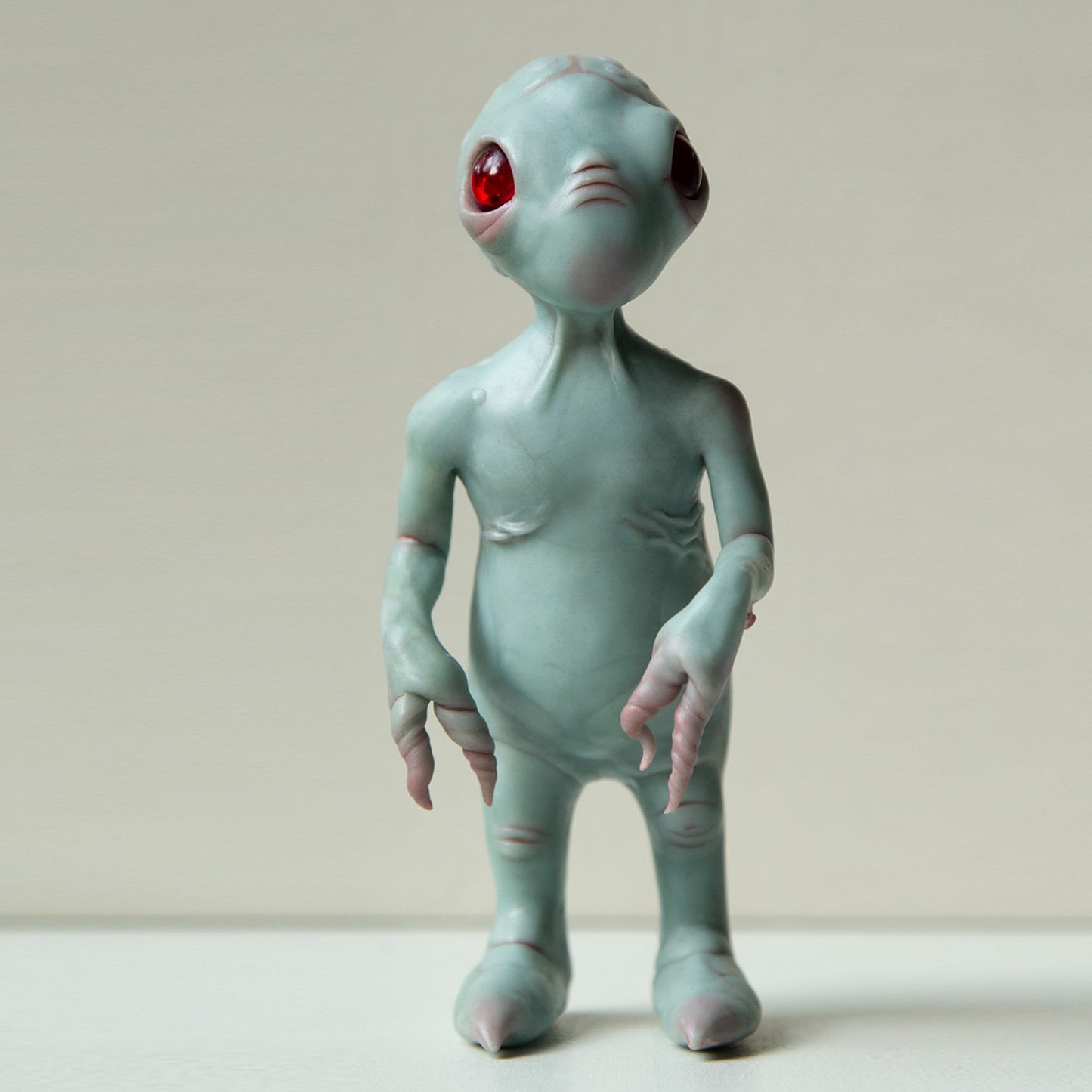 Grey alien baby doll sculpture, cute small extraterrestrial lifeform. OOAK art doll created and made in our team.