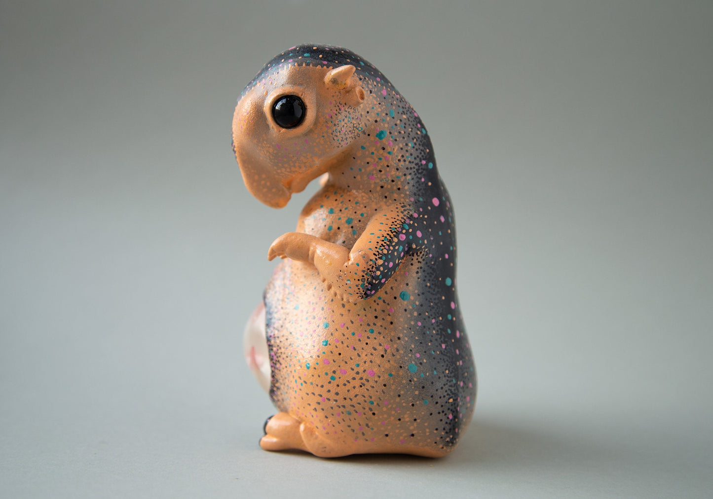 Alien sculpture of pregnant Tapir hybrid animal with hand painted abstract ornament