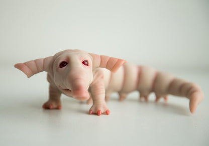 Weird fantastic beast alien baby doll sculpture, worm - elephant lil cutie