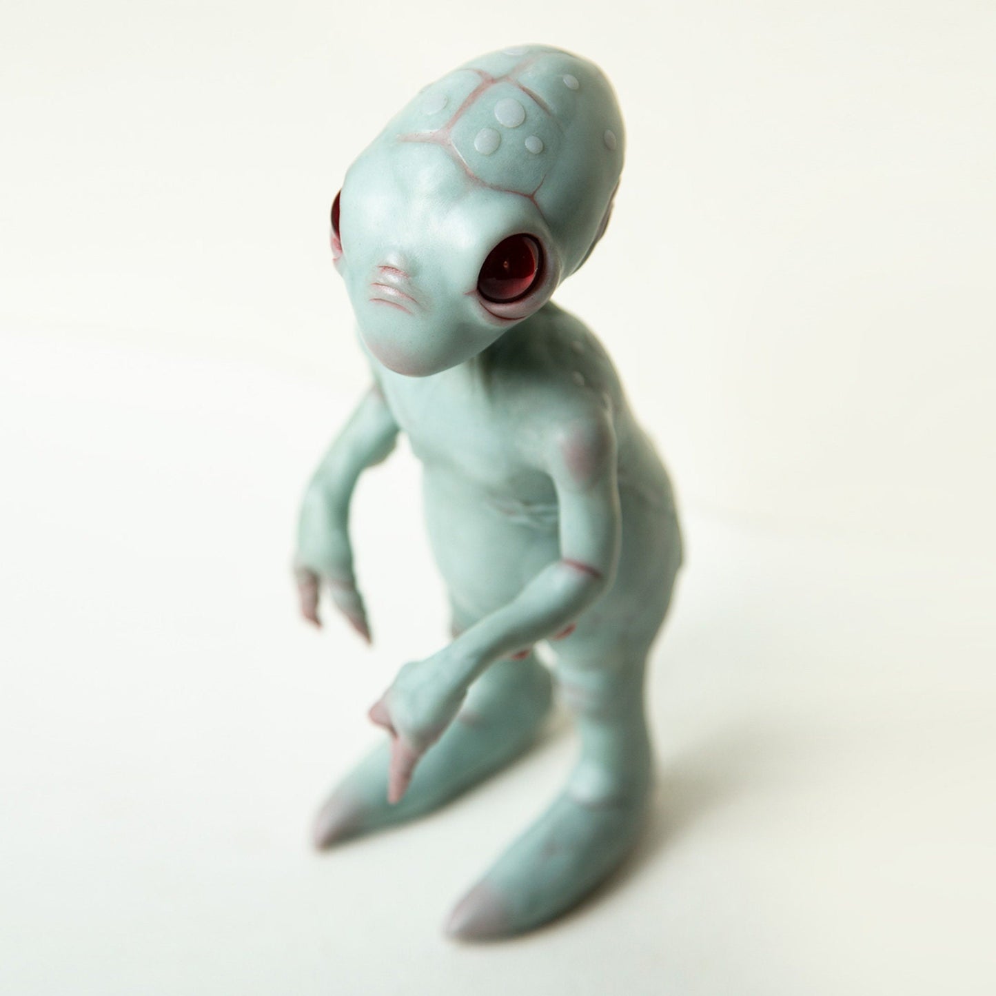 Grey alien baby doll sculpture, cute small extraterrestrial lifeform. OOAK art doll created and made in our team.