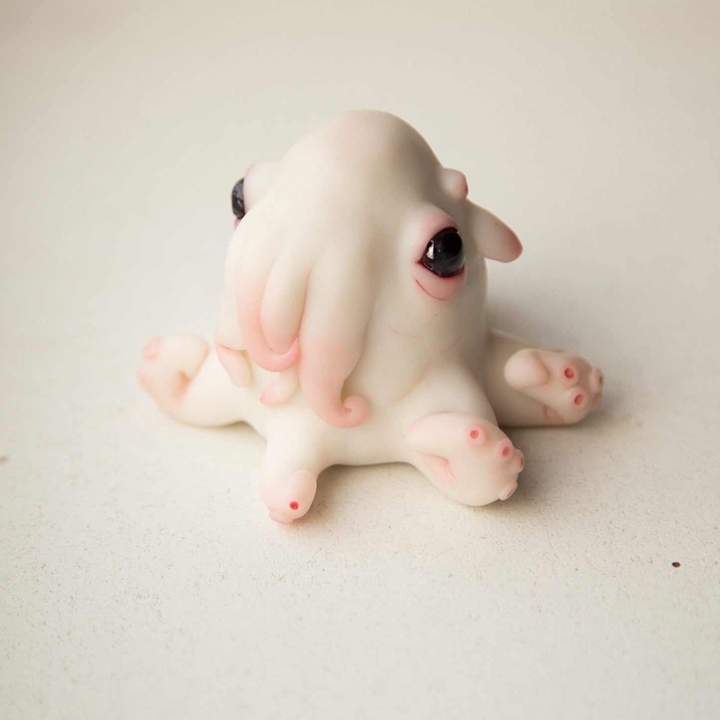 Octopus baby doll sculture, cute cthulhu anime figurine, kraken miniature creature art doll.