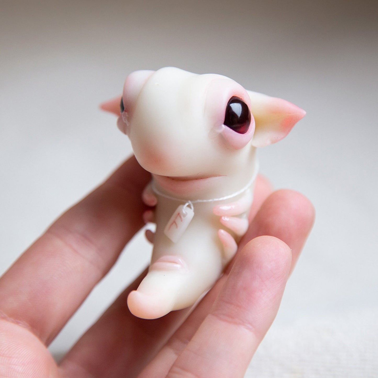 Creepy cute alien embryo monster doll figurine, polymer clay sculpture with rune protection