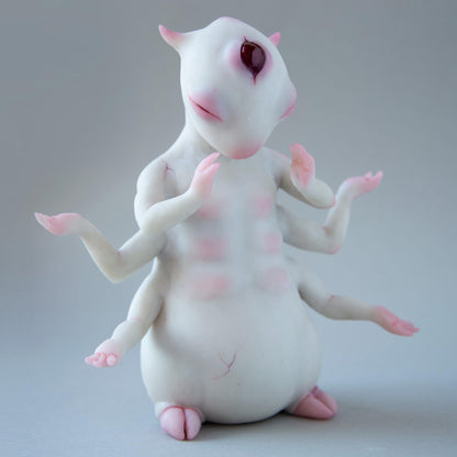 Alien budda creature statue with opened third all seeing eye, weird character from fantastic planet