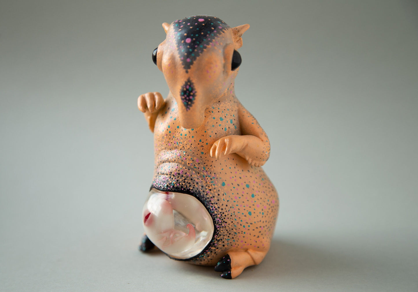 Alien sculpture of pregnant Tapir hybrid animal with hand painted abstract ornament