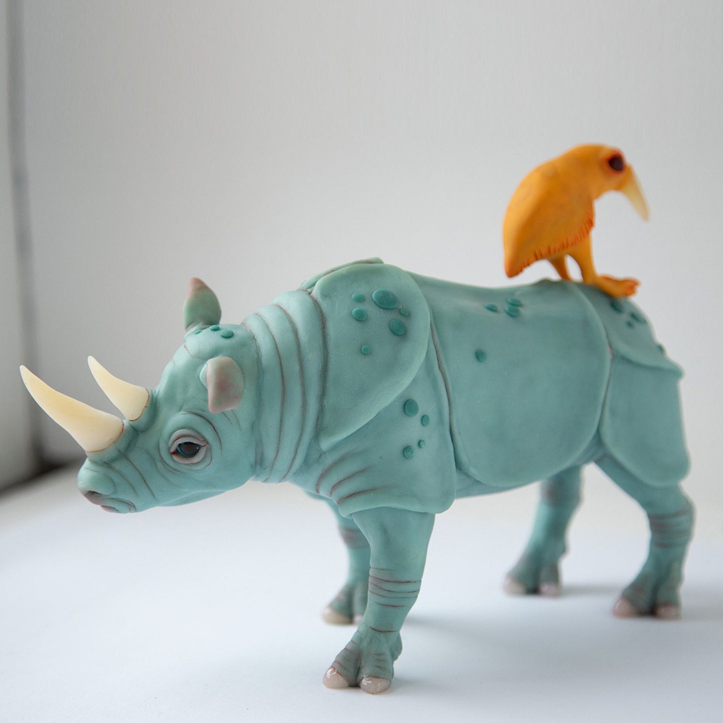 Perfect marriage - brilliant sculpture gift for couple, rhino and bird family statue